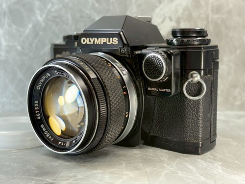 Exc lire olympus om - lire],