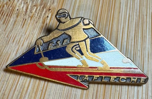 Médaille ski flèche de - de,