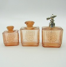 Marganne et Degrèze. Flacons et vaporisateur art déco en verre pressé moulé
