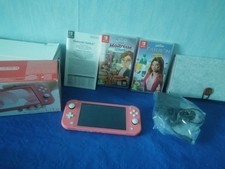 ***   CONSOLE  NINTENDO  SWITCH  LITE ROSE EN BOITE  +  2 JEUX  ET UN ETUI   ***