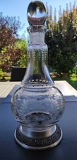 Magnifique carafe raffinée forme boule En cristal finement taillé sur base etain