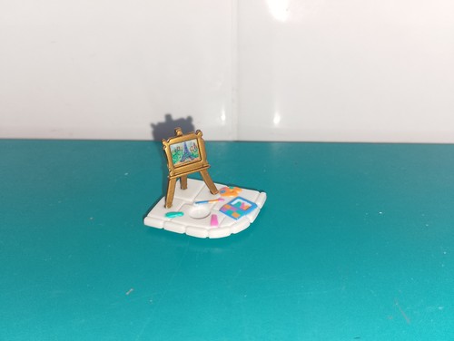 Polly pocket figurine doll