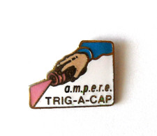 RNT 11/ Pin's  traceur de chantier ampere Trig a Cap