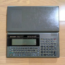 Ordinateur de poche SHARP PC-G820 calculatrice scientifique de base Japon d'o...