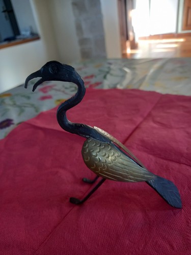 Ancien oiseau fer - ancien, en