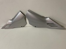 Carénages sous selle gauche