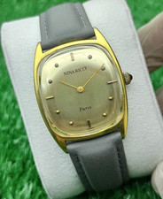 MONTRE MANUELLE ICONIQUE NINA RICCI GENEVE SWISS MADE 70s GOLDEN DIAL RARE