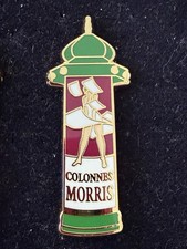 2 pin's  arthus bertrand