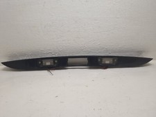 Cache lumière plaque