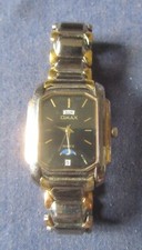ANCIENNE MONTRE OMAX QUARTZ