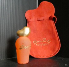 MINIATURE DE PARFUM  VINTAGE DECI DELA NINA RICCI  miniature + bourse