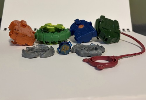 Assorted parts for beyblades - assorted,