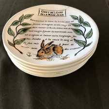 7 assiettes plates - faïence