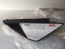 UN CARENAGE CACHE LATERAL ARRIERE GAUCHE DERBI 50 SENDA DRD RACING 00H00509081