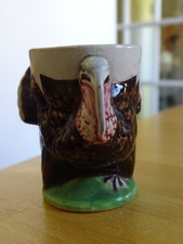 SARREGUEMINES UN ANCIEN COQUETIER EN FAIENCE  MODELE ANIMALIER