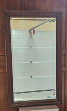 Miroir Ancien de style Louis XVI en bois sculpté avec glace biseautée