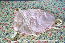Ancien porte-bébé en tissu