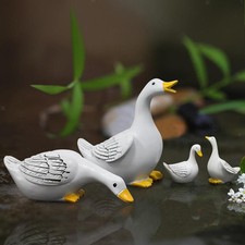 Lot de 4 figurines en résine