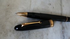 SPLENDIDE STYLO ROLLER OMAS OGIVE EN RESINE NOIRE - FINITION CANNELEE