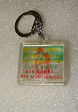 PORTE CLES PORTE CLEFS. CHANGE DE DESSIN EN L'INCLINANT. BISCUITERIE ANICHE NORD