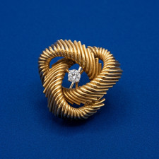 Broche MELLERIO noeud de