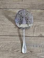 Ancienne pelle à asperges argent massif poinçon tête de vieillard