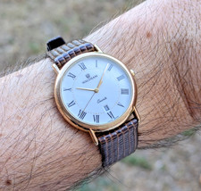 Montre Waltham quartz date  dress watch - très bel état - mouvement ETA 956-412