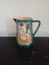 Carafe en faïence polychrome