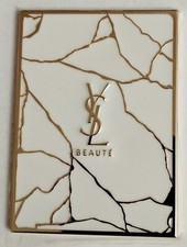 miroir Yves St Laurent doré 