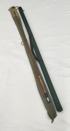 Canne pêche la - à,