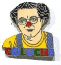 Pin's COLUCHE HUMORISTE Nez rouge