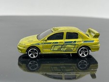 Mitsubishi Lancer Evolution Hot Wheels 2003, cod. P04, échelle 1/64 *-*