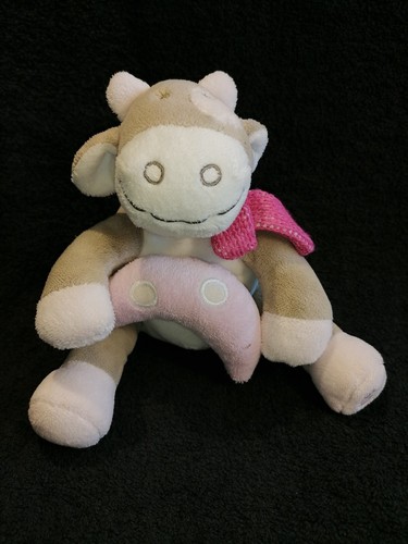 Doudou peluche musicale vache