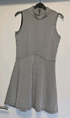 Cotton sleeveless high neck - on,
