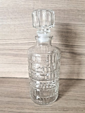 Bouteille en verre ciselé