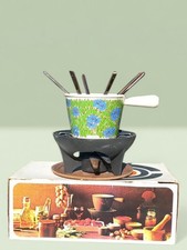 Service  à fondue en fonte