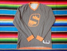 Pull d'échauffement sur le