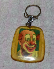 B6 / ANCIEN PORTE CLES INCLUSION clown SUBITO CHOCALAT MENIER