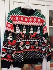 Joli Pull de Noël multicolore sur fond Noir