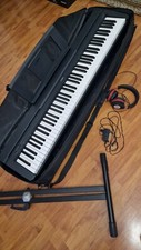 Piano Yamaha P45 + trépied + casque + housse