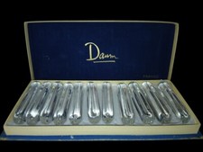 11 anciens Portes couteaux en