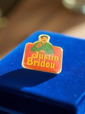 Pin's publicitaire vintage en