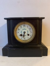 ancienne pendule de cheminée