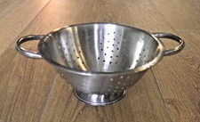 Ancienne passoire en alu avec