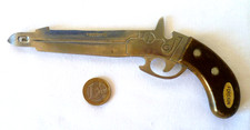 CURIEUX OUVRE BOITE DÉCAPSULEUR ANCIEN EN FORME DE PISTOLET