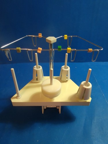 Thread holder for - thread,