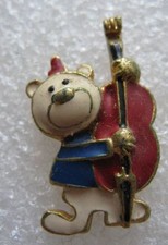 Pin's Animal Avec instruement