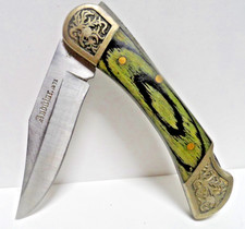 Couteau ancien pliant  Signé