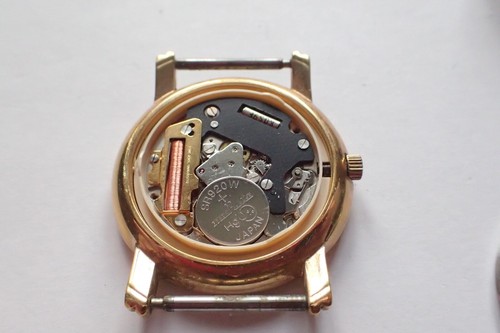 Montre homme dorée - à, quartz