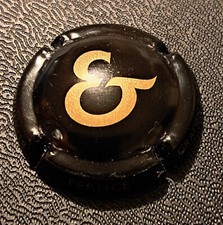 Plaque de muselet capsule de